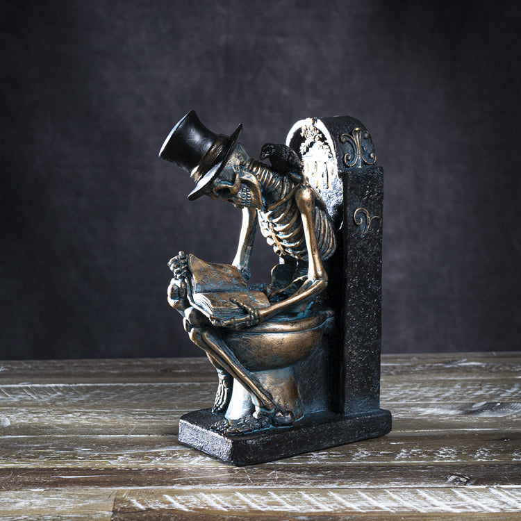 Skeleton Reading on Toilet figurine