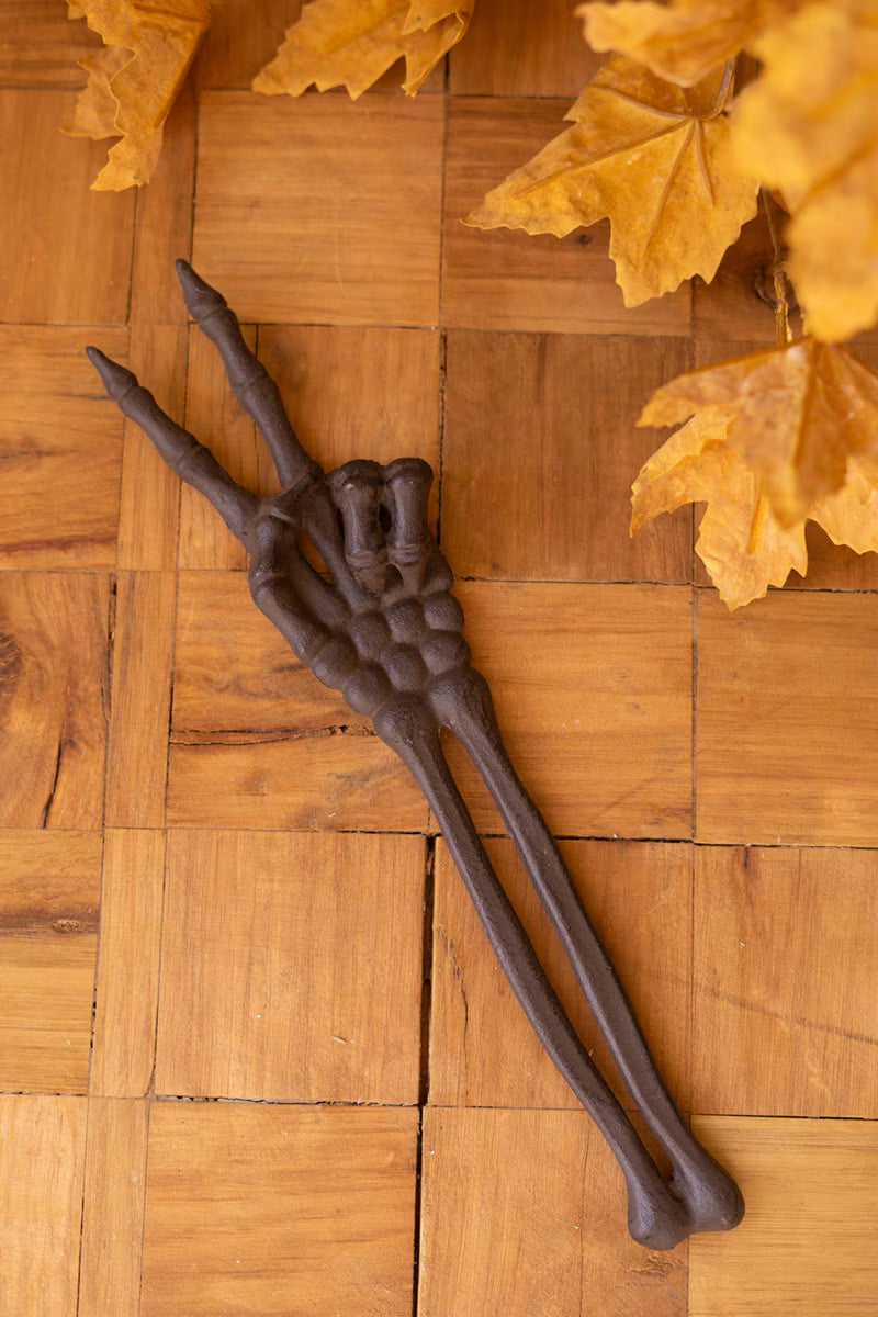 Cast Iron Skeleton Peace Sign