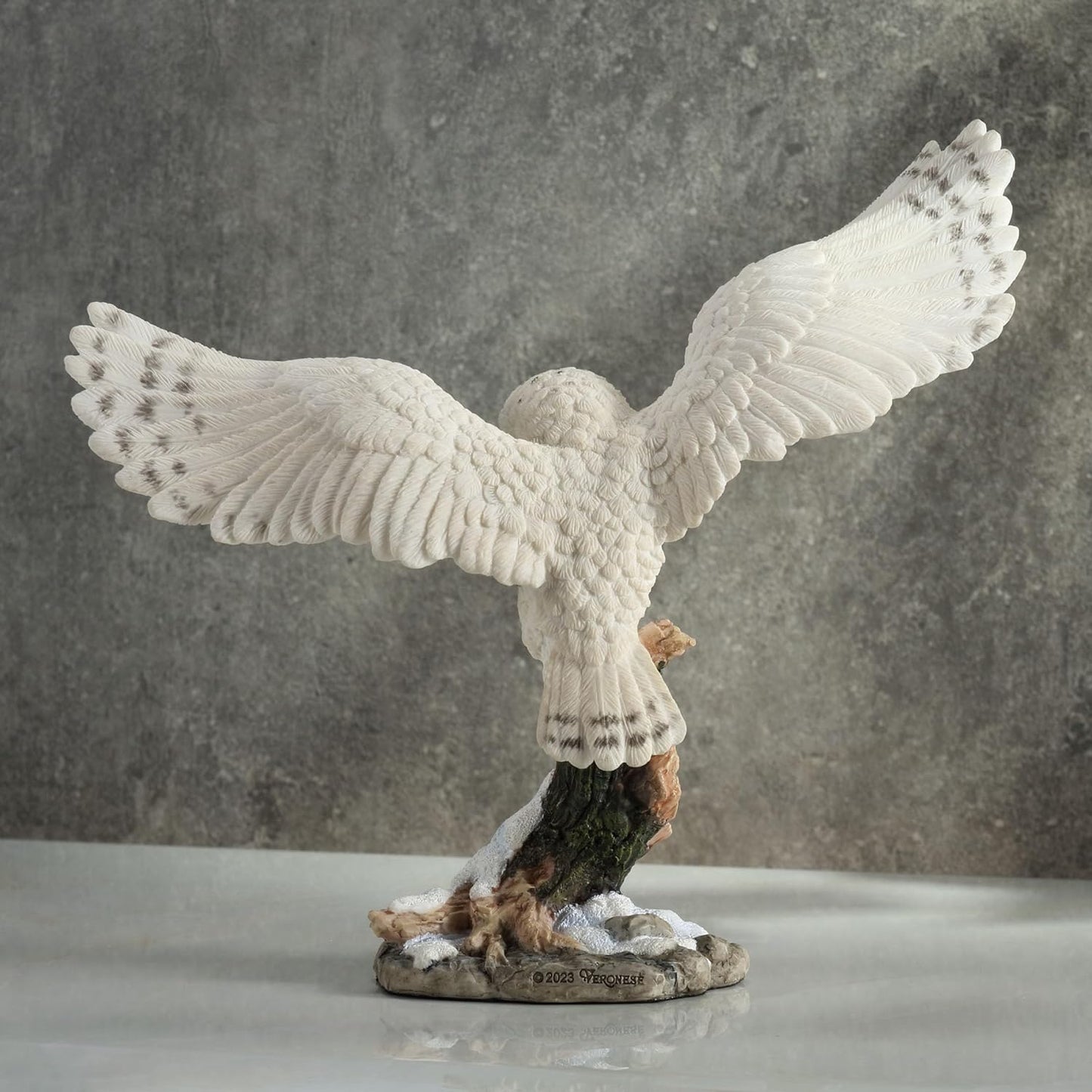 Snowy Owl Spread Wings Perching On Branch