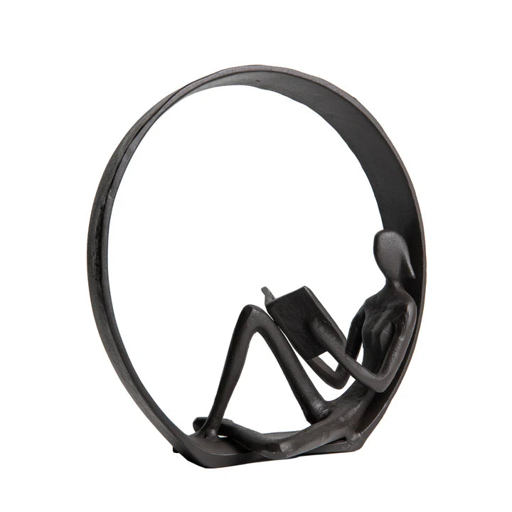 Encircled Reader Iron Sculpture