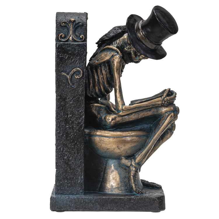 Skeleton Reading on Toilet figurine