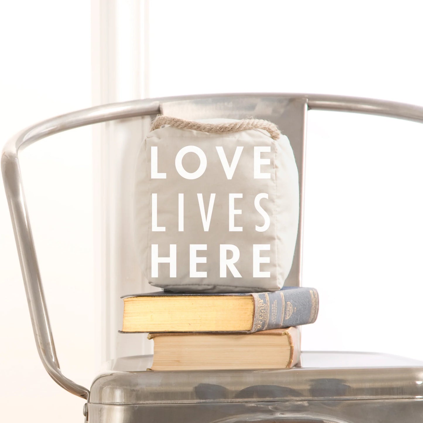 Love Lives Here 5" x 6" Door Stopper