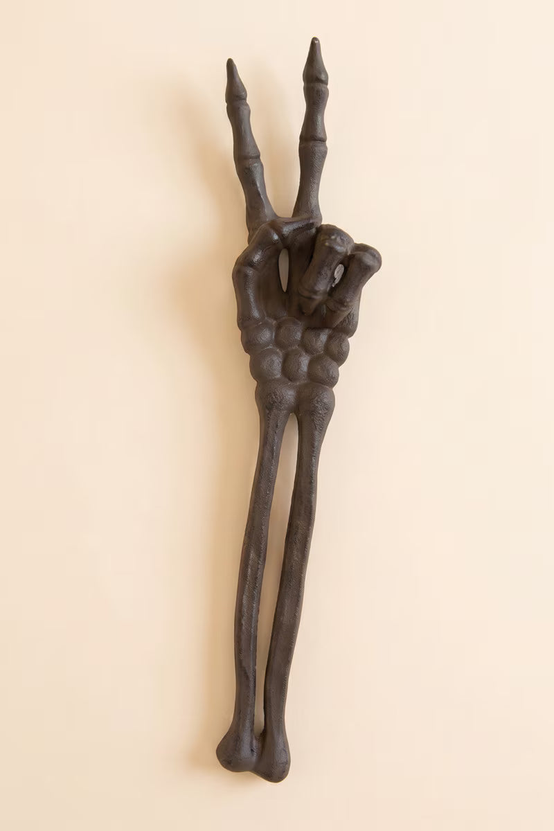 Cast Iron Skeleton Peace Sign