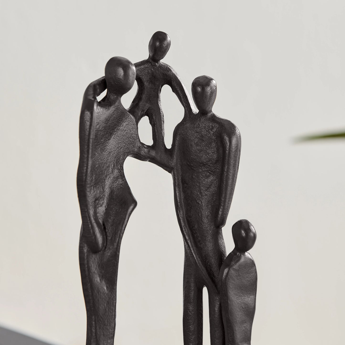 Brown Cast Iron Abstract Family of Four Together Sculpture - Tabletop Figurine For Desks, Accent Tables, or Shelves