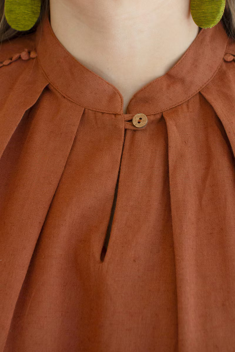 Cinnamon High-Neck Shortsleeve Blouse with Flat Pom-Pom Lace Detail