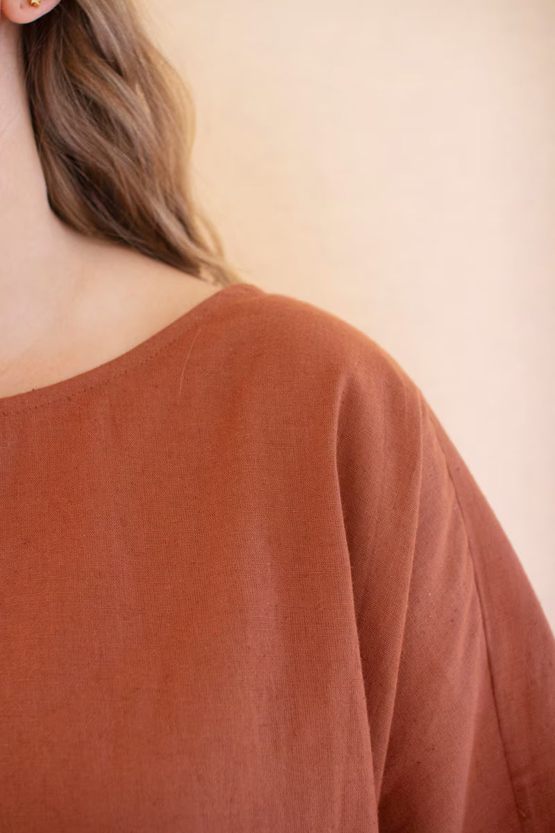 Cinnamon Short-Sleeve Blouse with Button Detail on Sleeves