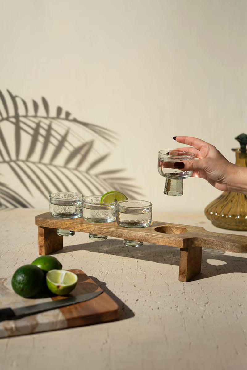 Tequila Flight with Four Glasses on a Wooden Tray