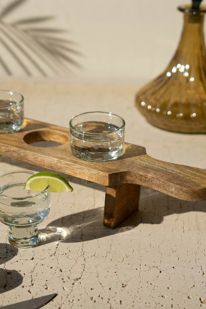 Tequila Flight with Four Glasses on a Wooden Tray