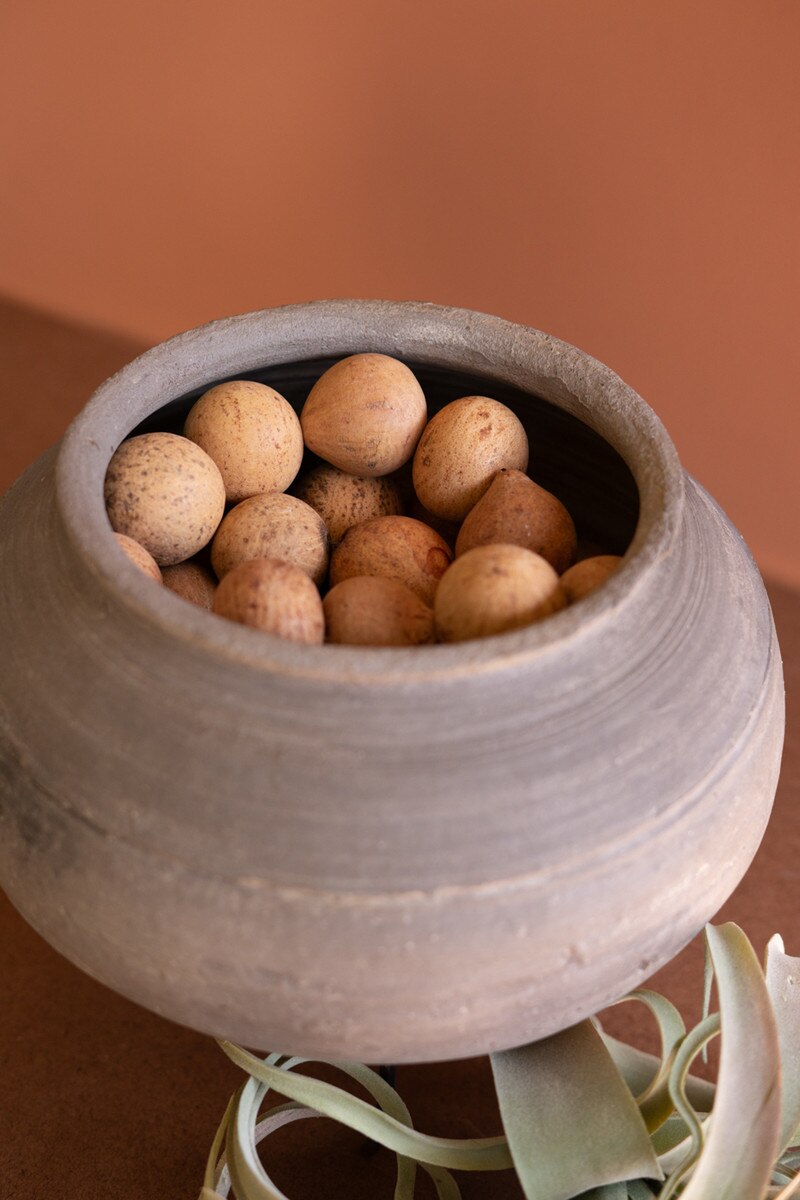 Black Clay Urn on an Iron Stand