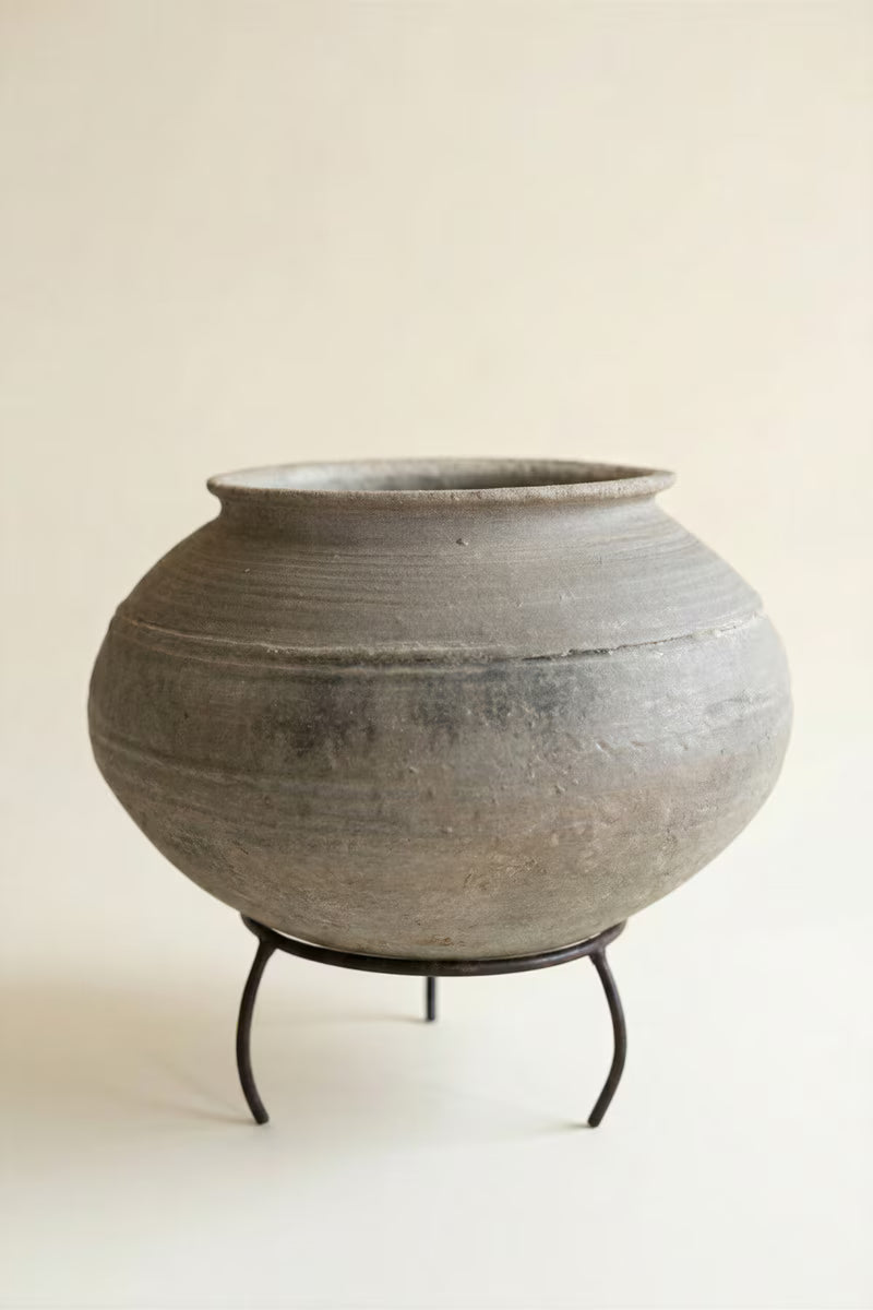 Black Clay Urn on an Iron Stand