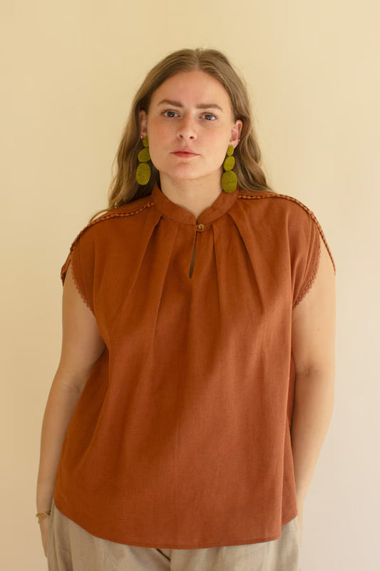 Cinnamon High-Neck Shortsleeve Blouse with Flat Pom-Pom Lace Detail