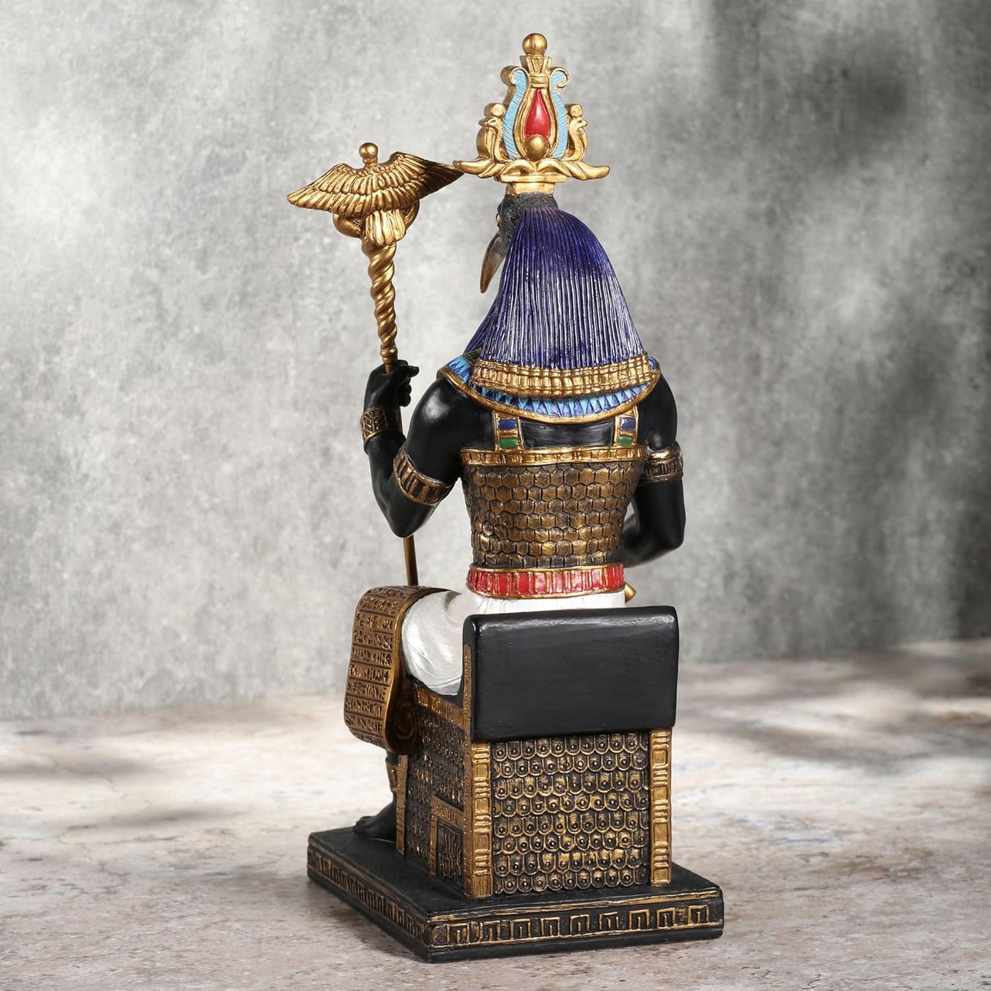 Thoth The Egyptian God Of Wisdom Sitting In His Throne