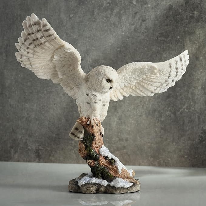Snowy Owl Spread Wings Perching On Branch