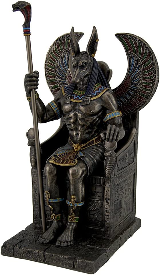 Egyptian God Anubis Sitting In A Throne