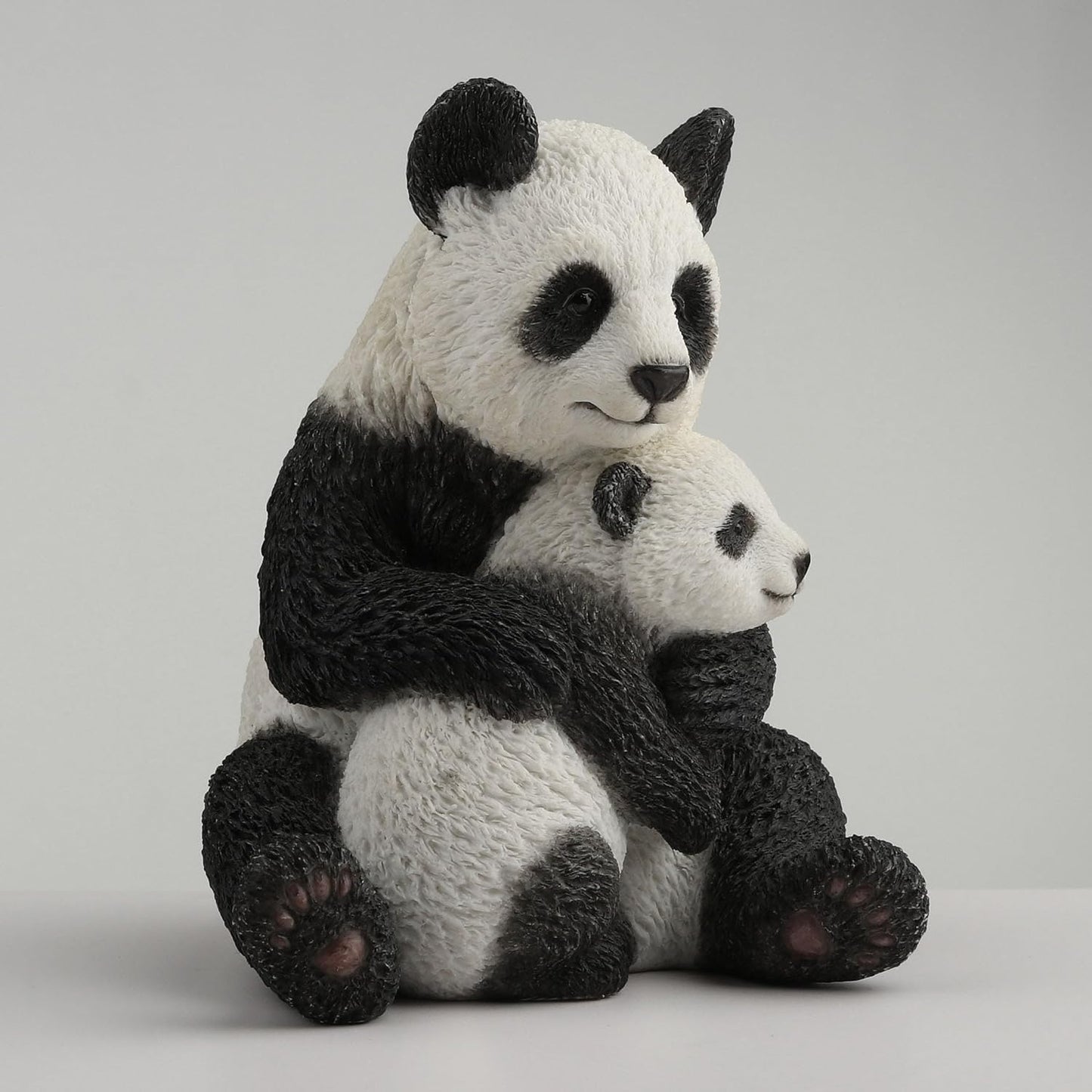 Mother Panda Hugging Cub