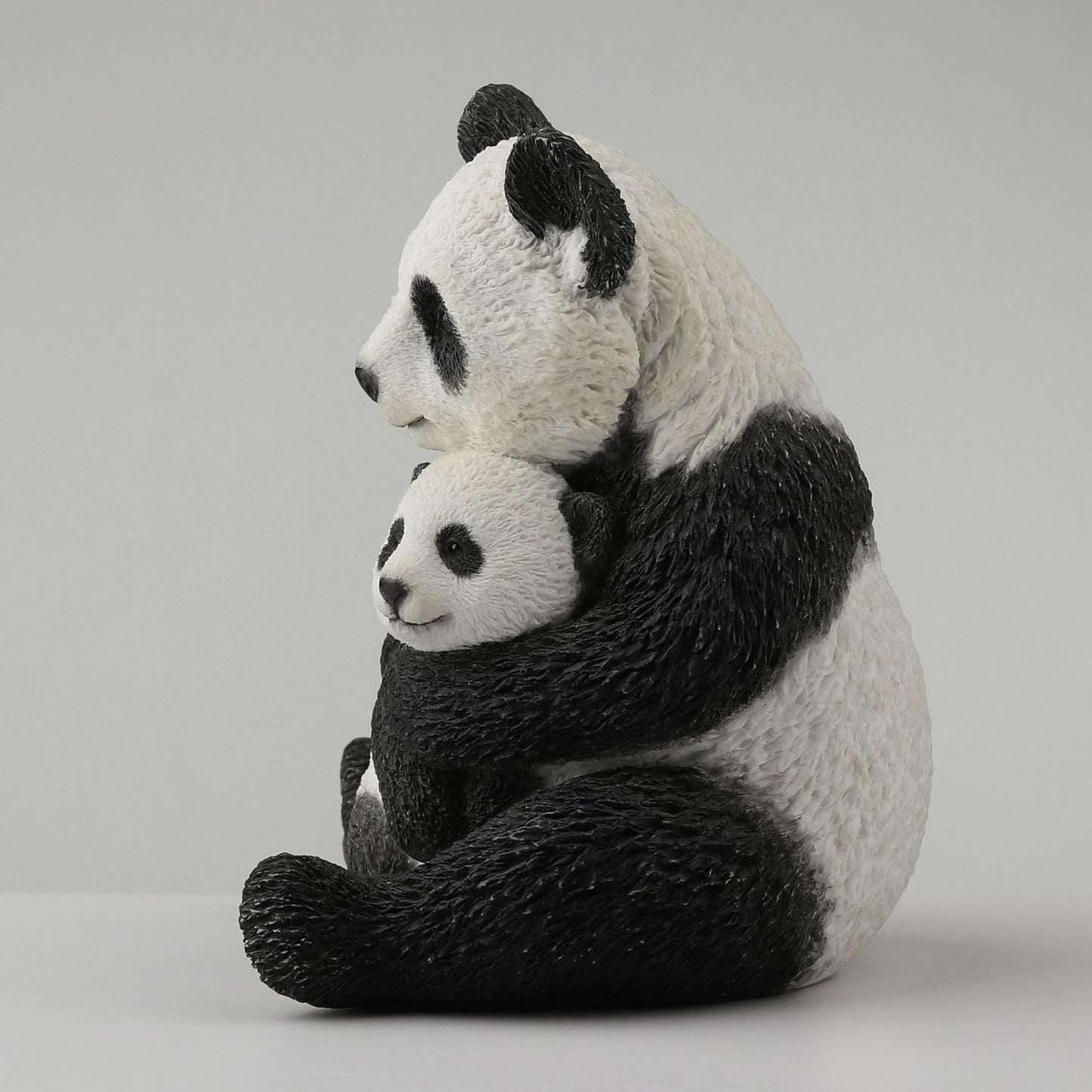Mother Panda Hugging Cub